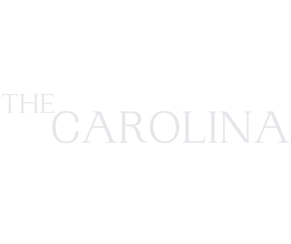 a black and white photo of the carolina logo